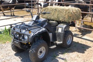 The ZAP DUDE electric ATV can carry up to 100 lbs on its cargo racks.